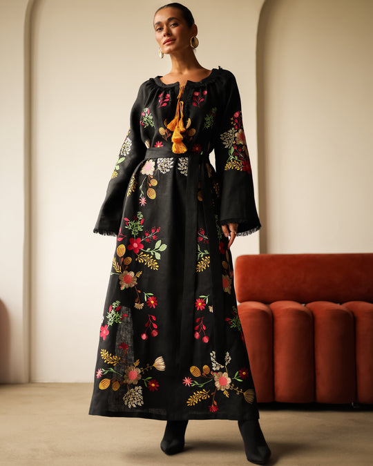 Black embroidered linen kaftan maxi dress with multi-color floral embroidery and mustard tassel ties — Zalxndra Resort