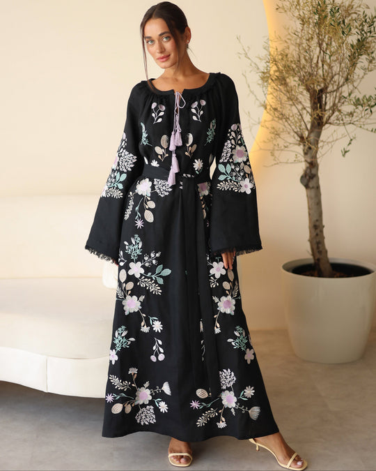 Black linen kaftan maxi dress with pastel floral embroidery and lilac tassel ties - Zalxndra Resort