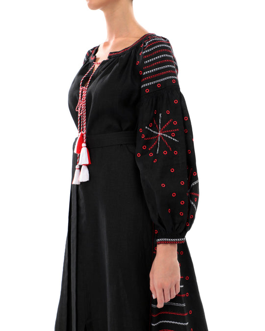 Black linen kaftan maxi dress with red and white geometric embroidery, balloon sleeves and red and white tassel ties, bodice detail view - Zalxndra Resort