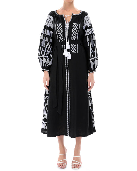 Black linen kaftan maxi dress with white geometric embroidery, balloon sleeves, tassel tie neckline and self-tie belt, front view - Zalxndra Resort