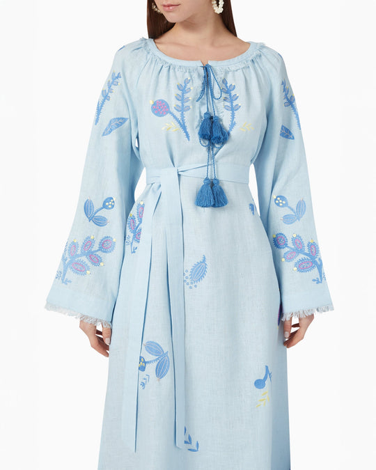 Bodice and angel sleeve detail of powder blue linen kaftan maxi dress with floral embroidery, frayed trim, and tassel ties - Zalxndra Resort