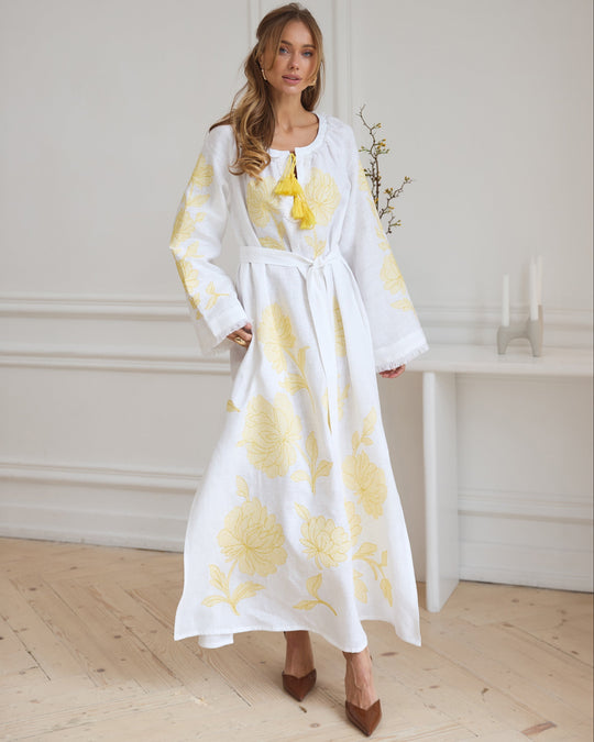 White linen kaftan maxi dress with yellow floral embroidery, angel sleeves, and tassel tie - Zalxndra Resort
