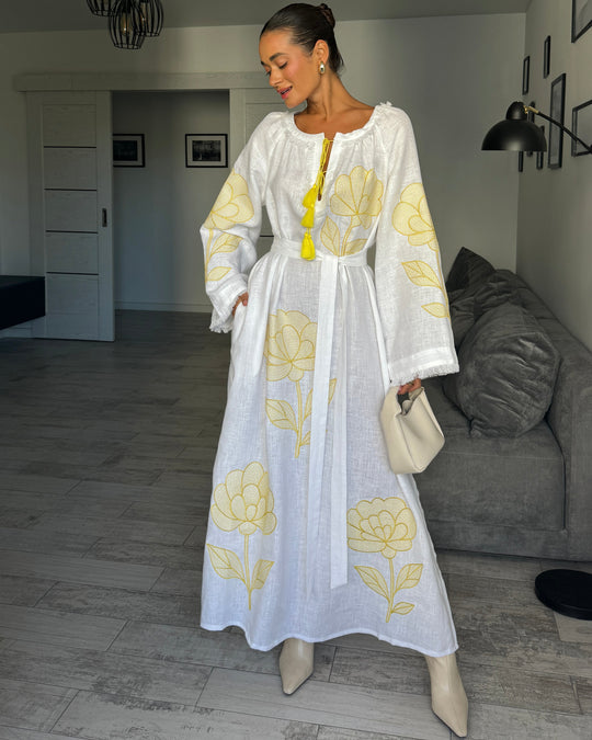 White linen kaftan maxi dress with yellow outlined floral embroidery, angel sleeves, and tassel tie - Zalxndra Resort